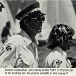 Senior Constable, (Jim) James Hardy at the Helm of Police Car